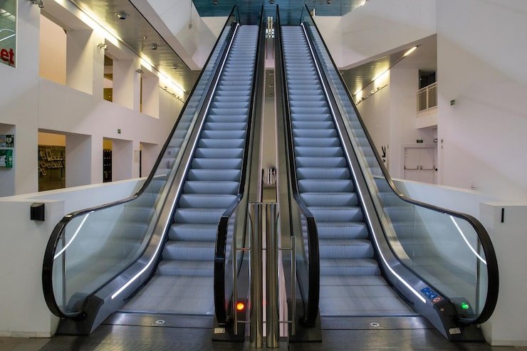 escalators-yellow-background-museum_913696-32