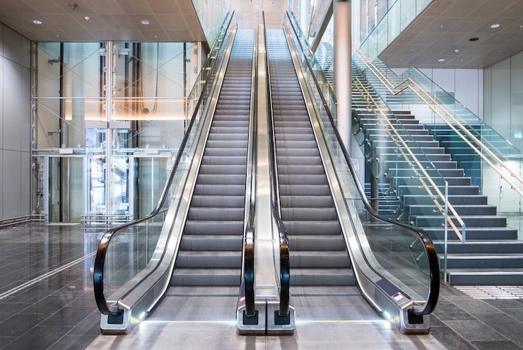 modern-luxury-escalators-with-staircase_49071-941
